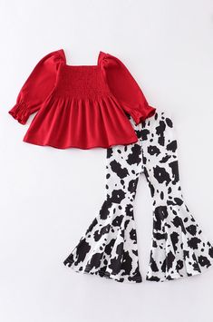 Look purrfectly stylish with this red shirt and cow print ruffle girl bell bottom set! With its vibrant colors and ruffled details, it's sure to make any girl stand out! (In a fun, fashionable way, of course!) Casual Ruffle Hem Sets For Spring, Casual Spring Sets With Ruffle Hem, Playful Red Ruffled Sets, Playful Red Fitted Sets, Playful Red Fitted Set, Playful Fitted Red Sets, Red Fitted Tops Matching Set, Cute Red Sets For Fall, Spring Red Ruffled Sets