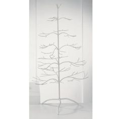 a white metal tree with branches on it