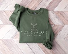 Looking for a hairdresser gift or shirts to show off your hair styling business? You've come to the right place! These personalized hairdresser sweatshirts are a stylish and cosy way to advertise your business. THE FIT  Our unisex sweatshirts are very cute and comfy! You can pair them with your favourite leggings, style them with your jeans, or add them as a layer for some extra warmth. Our sweatshirts are super cosy and perfect for the cooler months. MATERIALS AND SIZING These unisex sweatshirts are made with 50% cotton and 50% polyester. All of our designs are printed using non-hazardous and 100% biodegradable ink that meets the strictest industry standards. We use DTF printing which ensures that our designs are durable and long-lasting. Our unisex sweaters fit nice and loose -- just how Gift For Hairdresser, Styling Business, Hairdresser Gift, Leggings Style, 15% Off Sale, Advertise Your Business, Sweater Fits, Dtf Printing, Grad Gifts