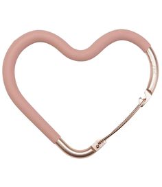 a pink heart shaped hair clip on a white background