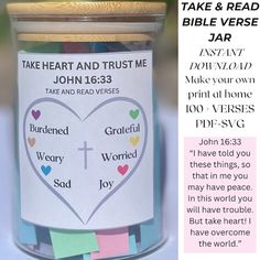 a jar filled with hearts and words next to a card that says take & read bible verse jar