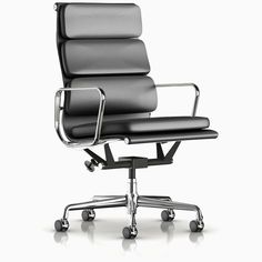 an office chair with wheels on the back and seat upholstered in black fabric