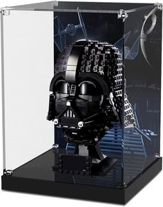 a lego darth vader helmet in a clear case