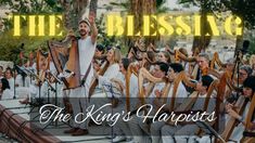 the king's harps are singing in front of a crowd with palm trees