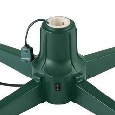 a green light fixture with two white lights on it's sides and an extension cord