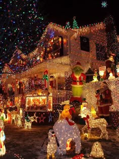 a house covered in christmas lights with the words christmas in queens 4 - 4 christmas lights outside