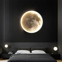 a large bed sitting under a giant moon in a bedroom next to a night stand