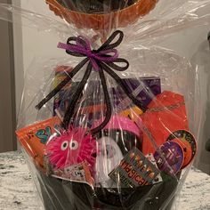 a basket filled with lots of candy and candies