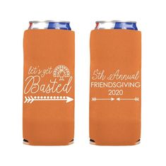 two orange can coolers with white lettering and an arrow on the side, one is for