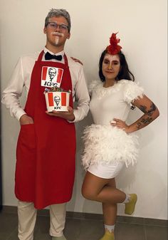 a man and woman dressed up in costumes