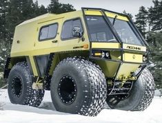 an off road vehicle is parked in the snow