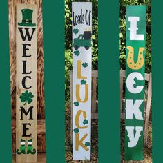 four st patrick's day signs are lined up