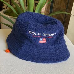 Polo Ralph Lauren Men’s Polo Sport Logo Fleece Bucket Hat Blue Size S/M Come With String But Can Be Taken Off Easily.Unisex Blue Bucket Hat For Outdoor, Casual Navy Bucket Hat For Outdoor, Navy Casual Beanie Hat, Navy Casual Winter Hats, Casual Blue Bucket Hat One Size, Blue Winter Bucket Hat With Curved Brim, Casual Navy Brimmed Bucket Hat, Blue Brimmed Bucket Hat For Outdoor, Casual Winter Bucket Hat With Short Brim