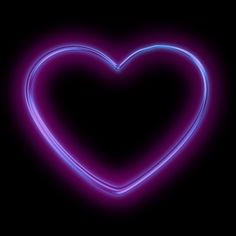 a heart shaped neon sign on a black background