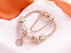 💕 Unlock Your Love Story! 💕 Introducing our New Rose Gold Plated United Hearts Charm Bracelet, the perfect accessory for expressing your unique bond! This stylish piece features: 💖 Heart Shape Lock Design - A symbol of everlasting love! 💖 Elegant Beads - Add a touch of sparkle to your wrist! 💖 Fashionable and Versatile - Ideal for any occasion, from casual to chic! Whether you're dressing up for a romantic date or adding flair to your everyday look, this bracelet is the perfect touch. Stack it with your favorite pieces for a trendy layered style! ✨ 🎁 Perfect Gift for Her - Great for birthdays, anniversaries, or just to show you care! Don't miss out on this beautiful charm bracelet--grab yours today and celebrate love in style! 💫❤️ Cheap Women's Chain Bracelet For Valentine's Day, Bangles Style, Perfect Gift For Her, Heart Charm Bracelet, Heart Charm, Rose Gold Plates, Or Rose, Heart Shapes, Favorite Jewelry