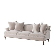 an image of a couch with pillows on it's back and side cushions upholstered