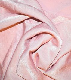 a close up view of a pink fabric