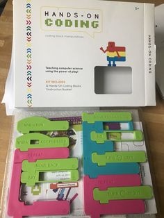 there are many different colored clips in the box on top of the table, and one is for sale