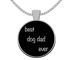 a necklace with the words best dog mom ever written in white ink on black background