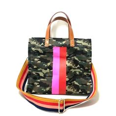 This Unlined Canvas Camo Bag Can Either Be Worn As A Shoulder Or Crossbody Bag. This Bag Measures 14.5*7*12.5 Inch. Shoulder Straps Are Pu And Crossbody Strap Is Fabric. Bag Has One Inside Pocket And Stripes Are Only On The Front Pink Canvas Satchel For Everyday, Pink Everyday Crossbody Satchel, Everyday Pink Canvas Satchel, Pink Leather Handled Crossbody Shoulder Bag, Pink Leather Handles Crossbody Shoulder Bag, Pink Leather Handle Crossbody Shoulder Bag, Pink Leather Crossbody Shoulder Bag With Leather Handles, Casual Pink Bags With Leather Handles, Pink On-the-go Canvas Bag