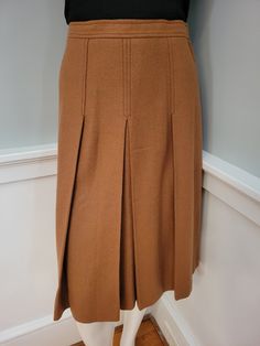 "Vintage Estee Laudar (sic) Lauder Estee Tokyo Lined Preppy Wool Pleated Midi Skirt XS Camel, tan, caramel color Marked Size 10, but runs very small. See measurements. Waist 24\" Hips 34\" Overall length from waist to hem 26\" Excellent vintage condition. Free shipping!" Tokyo Vintage, Vintage Preppy, Wool Skirt, Caramel Color, Wool Skirts, Pleated Midi Skirt, Vintage Ladies, Caramel, Camel