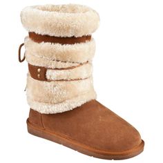 Lock out the cold this winter with a fashion forward look in the Bernie Shearling Winter Boots from Natural Reflections. Combining a genuine suede leather upper with a warm shearling lining, this sheepskin-style boot keeps your feet warm and cushioned. Under your foot, a padded sock provides further cushioning and insulation. A non-skid TPR outsole keeps you on your feet, indoors and out. Average height: 9". Imported.   Wintertime warmth with a sheepskin boot look  Genuine suede leather uppers How To Tan, Boots For Ladies, Tanning Skin Care, Lock Out, Boho Boots, Country Girls Outfits, Shearling Boots, Sheepskin Boots, Ladies Shoes