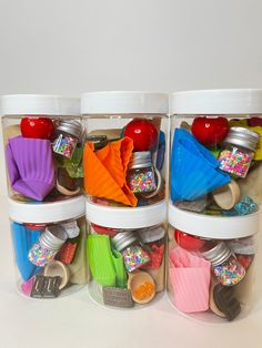 three plastic containers filled with different types of items