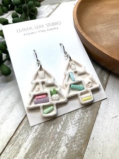 the earrings are made from polymer and have colorful shapes