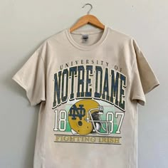 Vintage High School Tshirts, Sorority Alumni Shirts, University Tshirt Design Ideas, Notre Dame Game Day Outfit, University Shirt Design, College Tshirt Designs, Basketball Team Shirts, Frat Merch, High School Spirit Wear