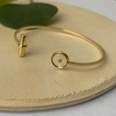 Adjustable 18k Gold Bangle Bracelet With A Tiny Mustard Seed In It. Tarnish Resistant. Hypoallergenic And Lightweight. Mustard Seed Bracelet, Tarnish-resistant Gold-tone Brass Bracelets, Gold-tone Tarnish-resistant Brass Bracelets, Gold Mustard Seed Necklace￼, Gold-tone Brass Bracelets, Tarnish Resistant, Mustard Seed Faith, Mustard Seed Jewelry, 18k Gold Bangle, Faith Bracelet