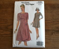 a sewing pattern for a women's dress and hat on a wooden surface with the words very easy very unique