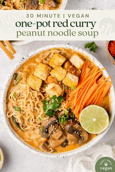 one pot red curry peanut ramen with tofu and carrots in a white bowl