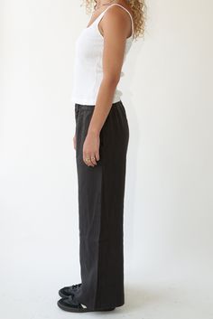 Our favorite everyday pant. Medium weight linen trouser featuring an elasticized waist band and hip pockets. Ankle length with a wide hem. Inseam is ~30". Details: - Barrel shape wide leg. - Tailored mock fly. - Garment washed to increase softness and remove shrinkage. 100% Linen sourced in California Louise is 5'8" and wears size Small. Elegant Wide Leg Bottoms For Everyday, Classic Full Length Linen Wide Leg Pants, Classic Full Length Wide Leg Linen Pants, Modern Linen Bottoms With Straight Hem, Modern Linen Bottoms With Relaxed Fit, Relaxed Fit Linen Wide Leg Pants, Business Casual Linen Wide Leg Pants, Fitted Linen Wide Leg Full Length Pants, Fitted Wide Leg Everyday Pants