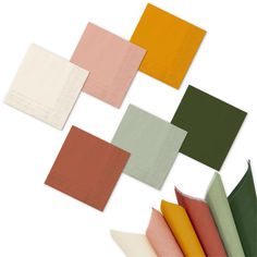 many different colors of napkins on top of each other