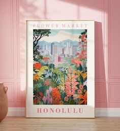 a flower market poster hangs on the wall in front of a vase and pink walls