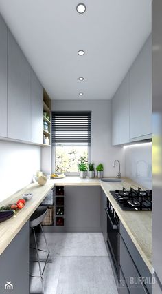 a modern kitchen with white and grey cabinets