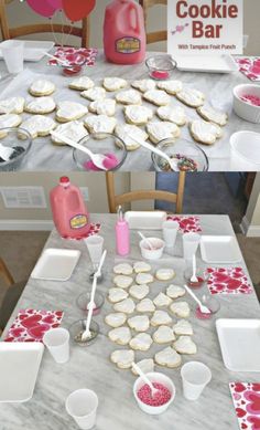 the table is set up with cookies and other desserts