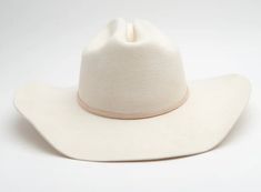 This hat is so beautiful and so elegant. The cream color is so pretty and would match with basically anything! This is more of a cowboy hat shaped hat.. rather than the flat/sun hats we have. Come with leather band (we can customize). One size fits all, adjustable band, 100% Wool. Bell Skirt, Speakers For Sale, Cardigan Vest, Heels & Wedges, The Cream, Flat Sneakers, Wool Hat, Cowboy Hat, Lucca