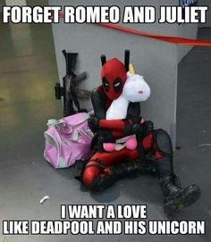 deadpool and unicorn sitting next to each other