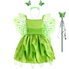 a green fairy dress with wings and a wand