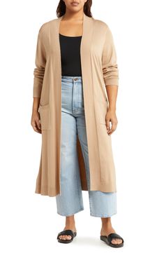 A longline profile updates your lounge-ready attire in a soft knit cardigan with roomy front pockets to store your belongings. 42" length (size 1X) Shawl collar Long sleeves 70% viscose, 30% nylon Machine wash, dry flat Imported Model stats: 5'10" height, 41" bust, 36" waist, 48" hip. Model is wearing size 1X. Tan Cardigan Outfit, Sweater Coat Outfit, Long Cardigan Outfit, Soft Knit Cardigan, Tan Cardigan, Longline Cardigan, Tan Sweater, Cardigan Outfits, Sweater Coat