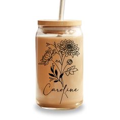 a glass jar with a straw in it