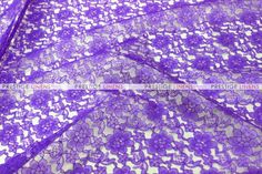 purple lace fabric with flowers on it