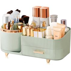 a green container filled with lots of beauty products