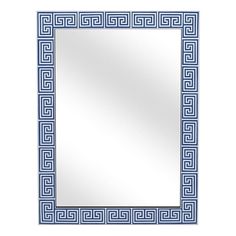 a blue and white mirror with an intricate design on the border, in front of a white background