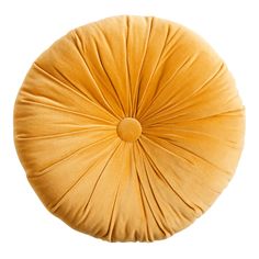 an orange round pillow on a white background