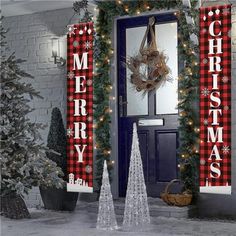 two christmas trees are in front of a door decorated with red and white plaid ribbon