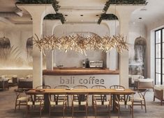 the interior of a coffee shop with wooden tables and chairs, hanging plants on the wall