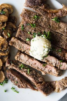 grilled steak with mushrooms on the side