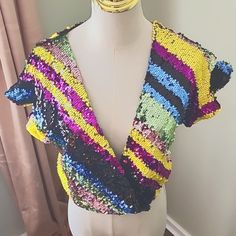 Anthropologie Rdalamal For Anthropologie Sequin Surplice Wrap Top In Xs Diagonal Stripes In Yellow, Purple, Blue, Black, Green, Pink Short Ruffle Sleeves Elastic Waistband Length 18" Pit To Pit 18" Waist 14" Laying Flat Unstretched Pullover Styling 100% Polyester Hand Wash New With Tags Wear Is Dressed Up With Heels, Or Jeans And Ballet Flats For Different Looks! Yellow V-neck Top For Party, Festive Multicolor V-neck Top, Yellow V-neck Top For Night Out, Festival V-neck Sequin Tops, Embellished Multicolor V-neck Tops, Yellow Fitted Top For Party, Multicolor Festive Tops For Party, Glamorous Multicolor Tops For Night Out, Glamorous Multicolor Evening Tops